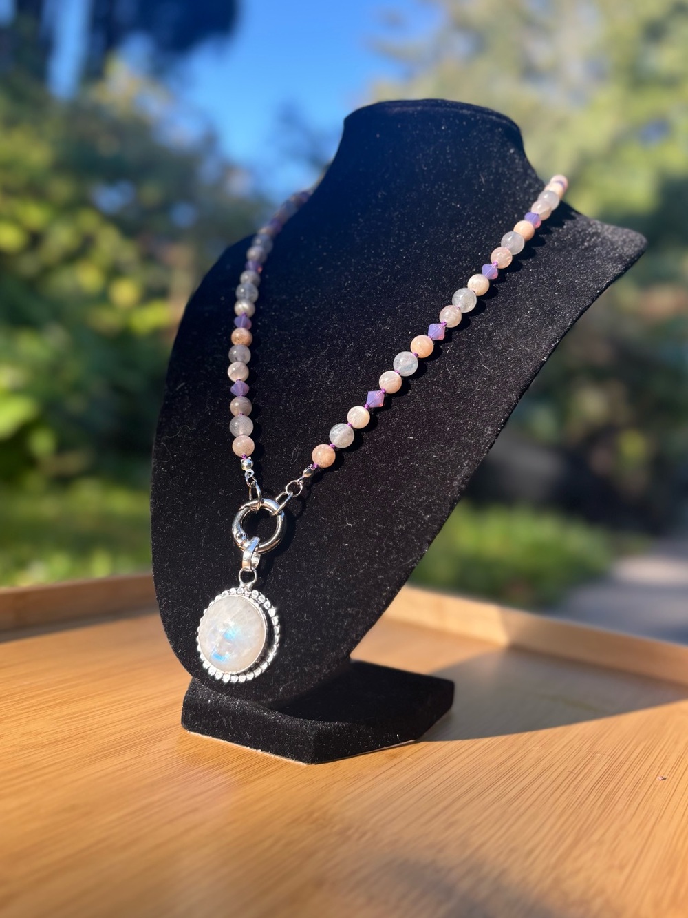 Beaded moonstone necklace and rainbow moonstone pendant.